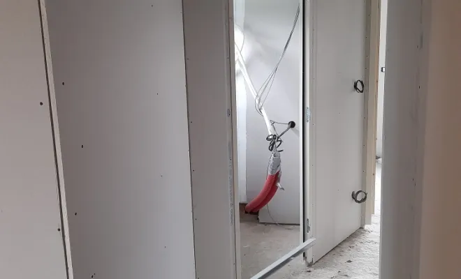 Réalisation d'extensions d'une maison proche de Croix