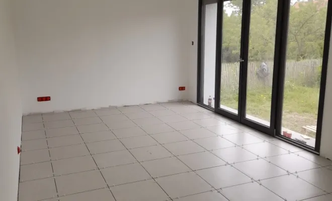 Réalisation d'extensions d'une maison proche de Croix