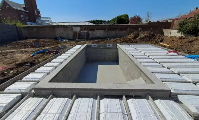 Coulage d'une dalle béton sur planchers hourdis pour une maison individuelle à Allennes-les-Marais