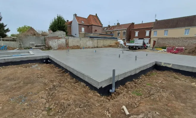Coulage d'une dalle béton sur planchers hourdis pour une maison individuelle à Allennes-les-Marais