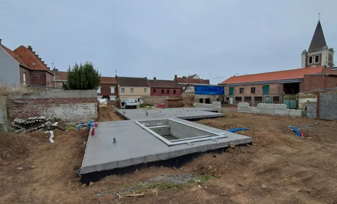 Coulage d'une dalle béton sur planchers hourdis pour une maison individuelle à Allennes-les-Marais