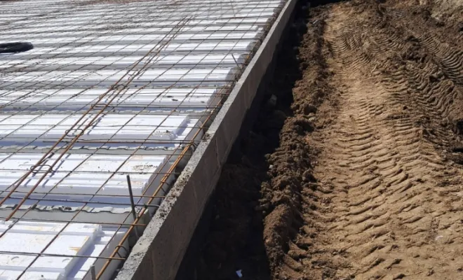 Coulage d'une dalle béton sur planchers hourdis pour une maison individuelle à Allennes-les-Marais