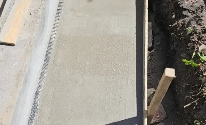 Réalisation d'une assise en béton sur une terrasse proche de Roubaix