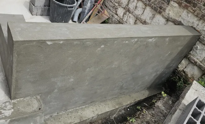 Réalisation d'une assise en béton sur une terrasse proche de Roubaix