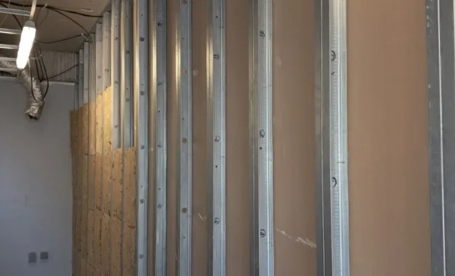 Réalisation d'un mur séparatif entre deux cellules commerciales à Lesquin