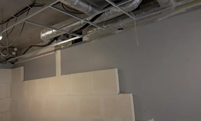 Réalisation d'un mur séparatif entre deux cellules commerciales à Lesquin