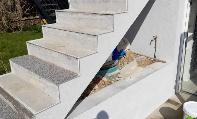 Création d'escalier béton et résine et pose de garde corps à Roubaix